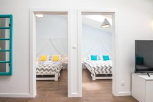 Posteľ alebo postele v izbe v ubytovaní 2-Bedroom Apartment - Sarego 16 + 4 fotografie