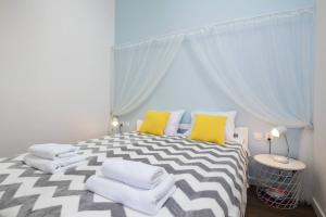 Posteľ alebo postele v izbe v ubytovaní 2-Bedroom Apartment - Sarego 16
