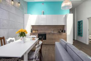 Kuchyňa alebo kuchynka v ubytovaní 2-Bedroom Apartment - Sarego 16