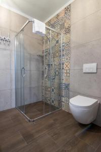 Kúpeľňa v ubytovaní 2-Bedroom Apartment - Sarego 16