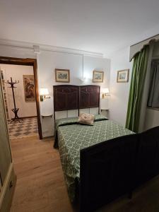Postel nebo postele na pokoji v ubytování B&B Casa Tessieri
