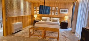 Postel nebo postele na pokoji v ubytování Hotel Toriba