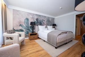 Ένα ή περισσότερα κρεβάτια σε δωμάτιο στο Waldhotel Luise