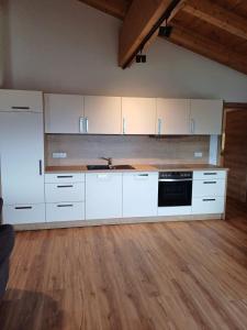 Cucina o angolo cottura di Ferienwohnung Buchmann