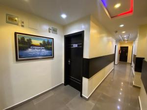 TV a/nebo společenská místnost v ubytování Hope Residence Hotel and Suites