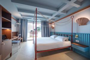 Voodi või voodid majutusasutuse Murè Hotel Numana toas