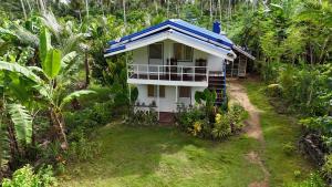 Zahrada ubytování Bayay ni Nanay Bed & Breakfast in Magpupungko Beach Road