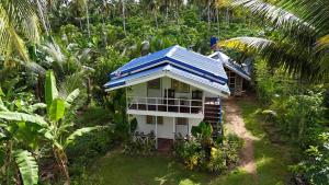Zahrada ubytování Bayay ni Nanay Bed & Breakfast in Magpupungko Beach Road