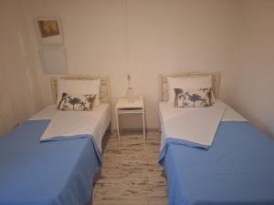 Postel nebo postele na pokoji v ubytování Casa Dei Fiori