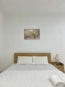 Postel nebo postele na pokoji v ubytování Maria Hotel