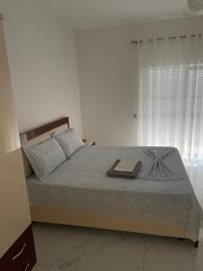 Postel nebo postele na pokoji v ubytování Vila Ornela