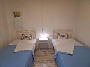 Postel nebo postele na pokoji v ubytování Casa Dei Fiori