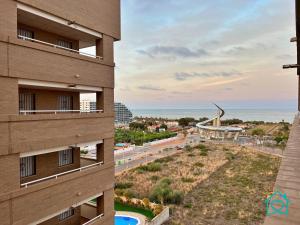 a view of the ocean from a building at Retiro Zen en Tu Rincón Mediterráneo in Oropesa del Mar