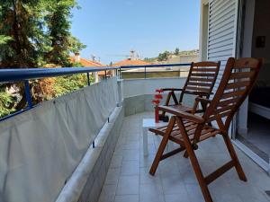 Ein Balkon oder eine Terrasse in der Unterkunft Cozy Sun