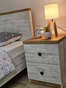 Postel nebo postele na pokoji v ubytování Apartman Sky