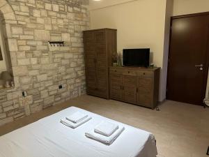 Μια τηλεόραση ή/και κέντρο ψυχαγωγίας στο Panorama Stone Villa