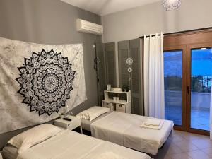 Ένα ή περισσότερα κρεβάτια σε δωμάτιο στο Panorama Stone Villa