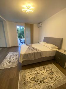 Postel nebo postele na pokoji v ubytování Casa Gazi