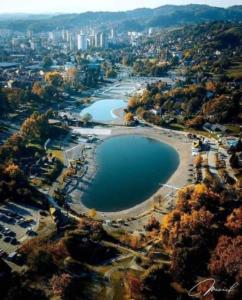 an aerial view of two lakes in a city at Apartmani Star in Tuzla