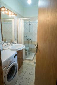Koupelna v ubytování Thalami Apartment