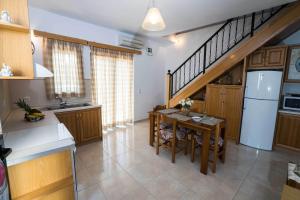 Kuchyň nebo kuchyňský kout v ubytování Thalami Apartment