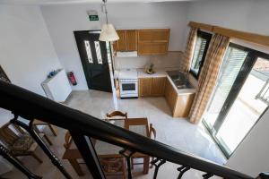 Kuchyň nebo kuchyňský kout v ubytování Thalami Apartment