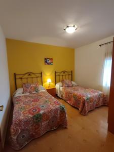 Posteľ alebo postele v izbe v ubytovaní Vivienda Rural Belén