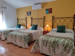 Posteľ alebo postele v izbe v ubytovaní Vivienda Rural Belén