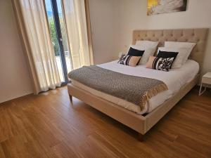 Posteľ alebo postele v izbe v ubytovaní Résidence Villas Chléa + 30 fotografií
