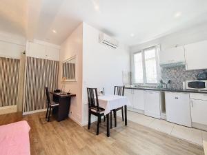 Кухня или мини-кухня в Appartement Des Iles
