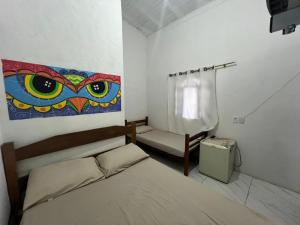 Postel nebo postele na pokoji v ubytování Toca do Pato Pousada + 37 fotografií