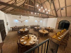 an overhead view of a dining room with tables and chairs at Tříletý Mlýn in Police