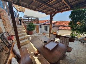 Balkón nebo terasa v ubytování Holiday House Pag
