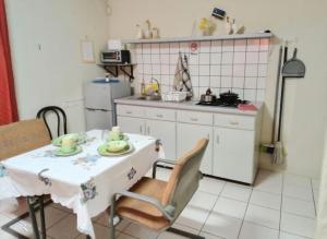 Kuchyň nebo kuchyňský kout v ubytování STUDIO/ APARTAMENTO