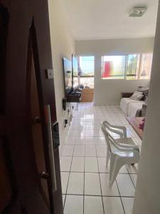 Et tv og/eller underholdning på Apartamento mobiliado