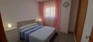 Postel nebo postele na pokoji v ubytování Costa Azahar 1