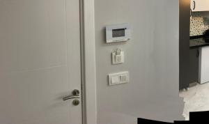 a door with a microwave on top of it at Fabesco Suite in Istanbul