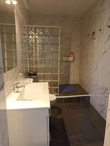 a bathroom with a sink and a shower at Villa Panoramica / La Nucia (Costa Blanca) in La Nucía +39 photos