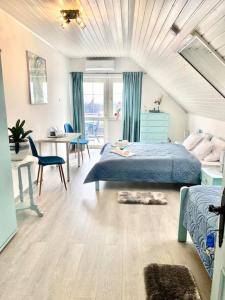 Postel nebo postele na pokoji v ubytování Tünde NENE Apartman + 37 fotografií