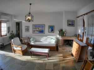 Posezení v ubytování Paradiso Apartments with sea view