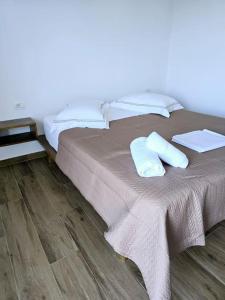 Postel nebo postele na pokoji v ubytování Ambelas Getaways