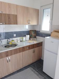 Cucina o angolo cottura di Apartman Bojković