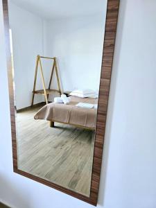 Postel nebo postele na pokoji v ubytování Ambelas Getaways