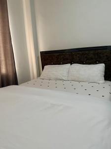 Postelja oz. postelje v sobi nastanitve Stelvic Luxurious 1 bedroom Airbnb Thika