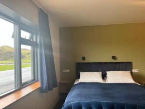 Krevet ili kreveti u jedinici u okviru objekta Hótel Skógafoss by EJ Hotels