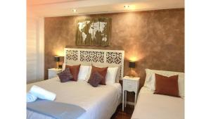 A bed or beds in a room at Rizzi Marianna B&B
