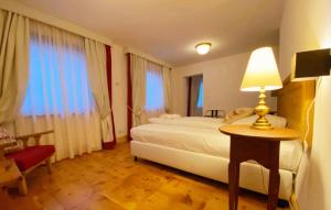 Postel nebo postele na pokoji v ubytování Chesa Bernina + 1 fotografie