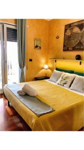 A bed or beds in a room at Rizzi Marianna B&B