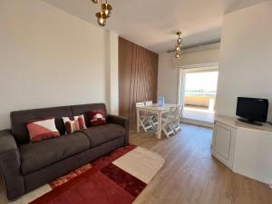TV a/nebo společenská místnost v ubytování Blue Moon Penthouse