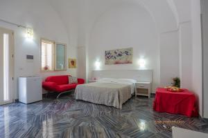 A bed or beds in a room at Casa Alfieri"rooms and Apartments"